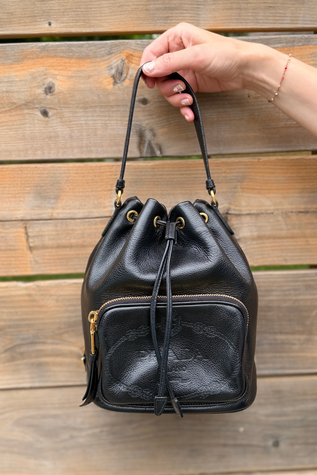 Prada Glace Calf Logo Embossed Bucket Bag